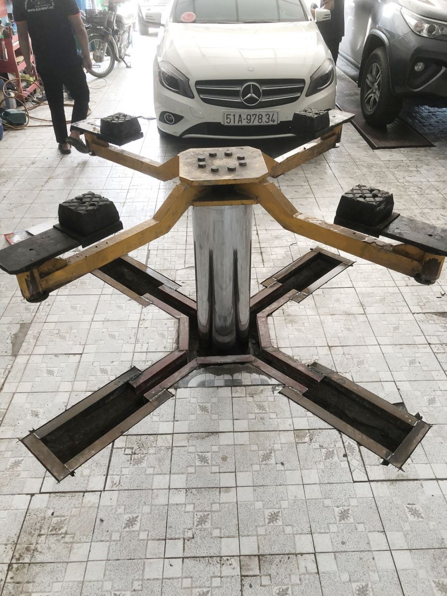 Cầu nâng 1 trụ rửa xe kiểu chữ X âm nền VIMET VLWS3500